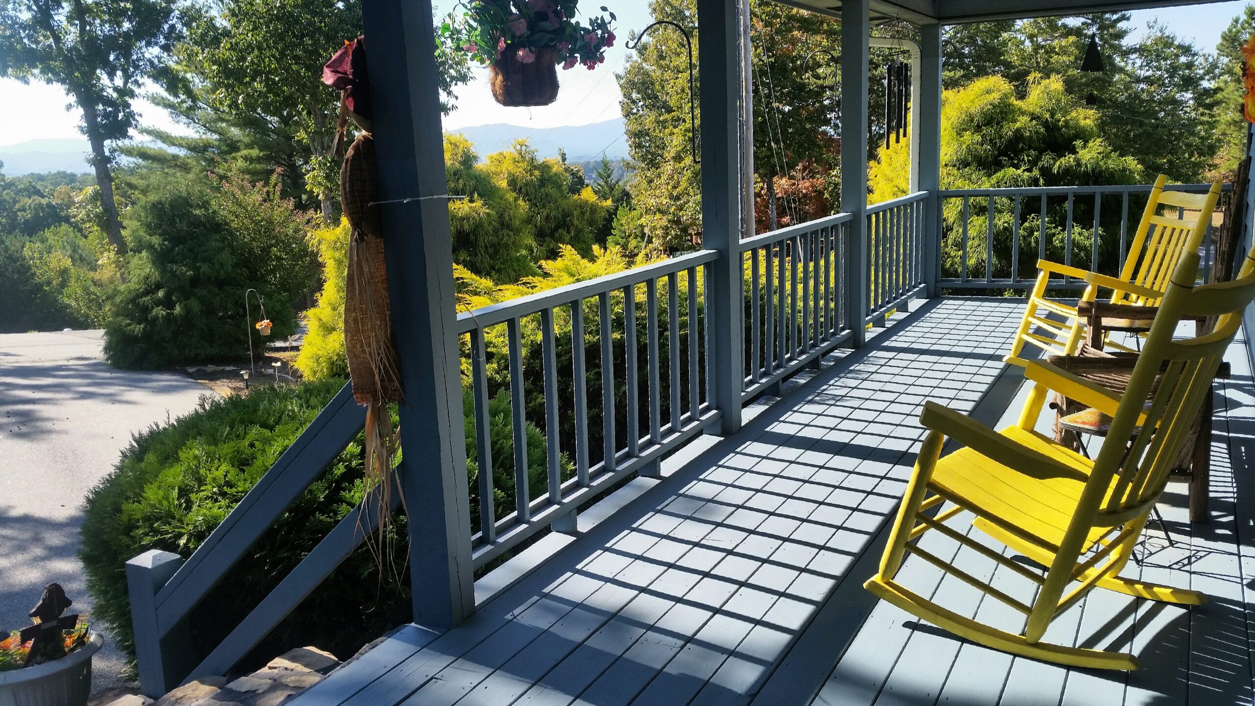 Deck painting completed on a residential veranda with timber flooring